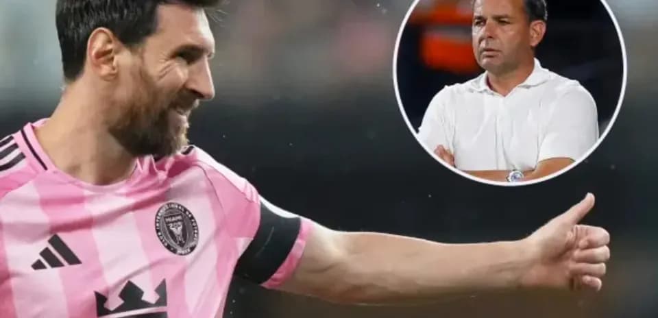 Lionel Messi gesturing during a match with coach observing