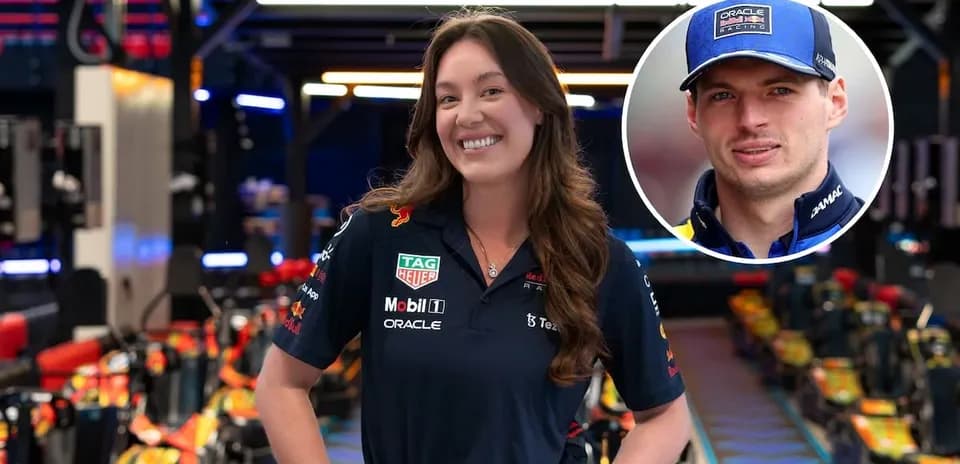 Mujer con camiseta de Red Bull en box de F1