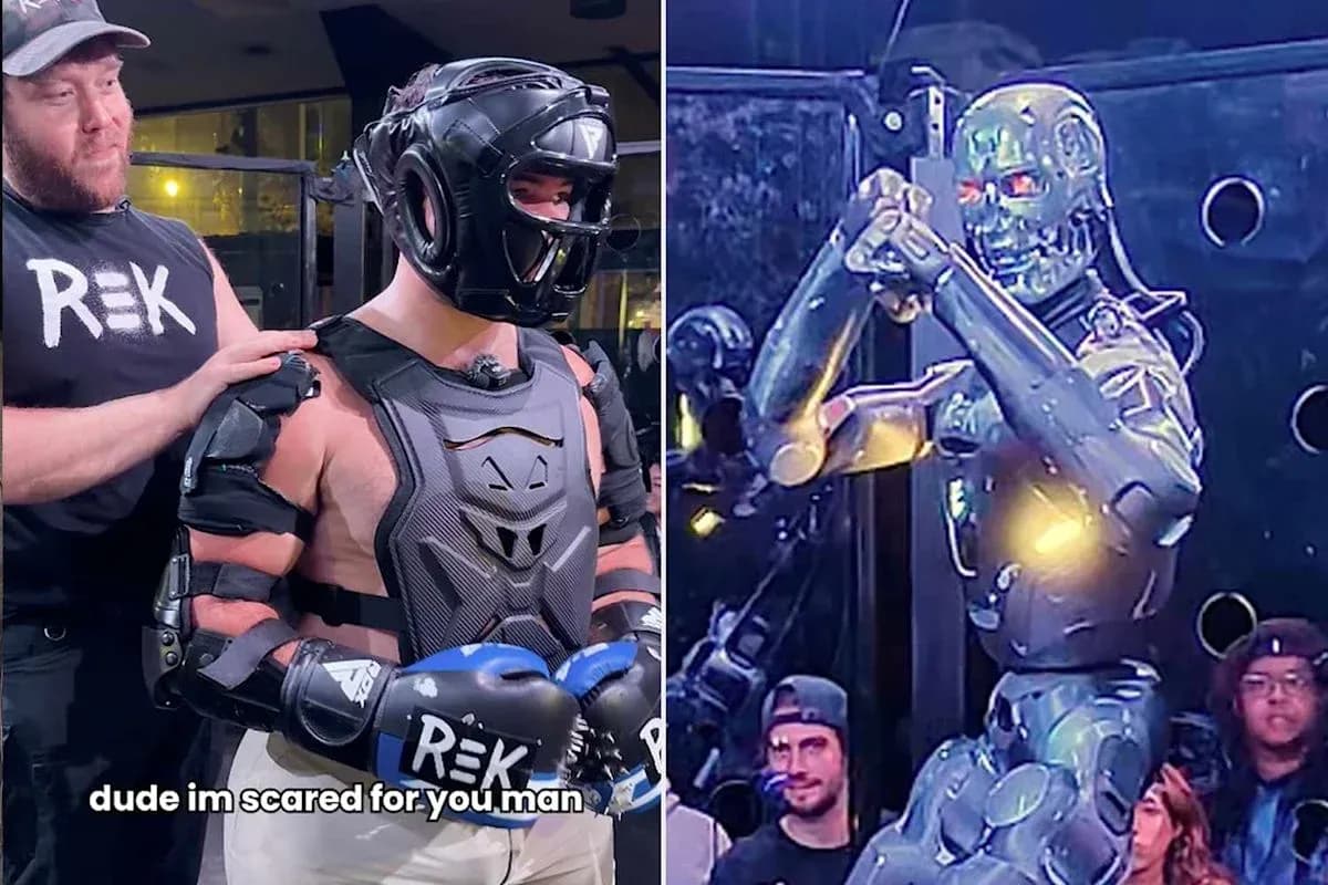 Competitor in protective gear facing a robot opponent