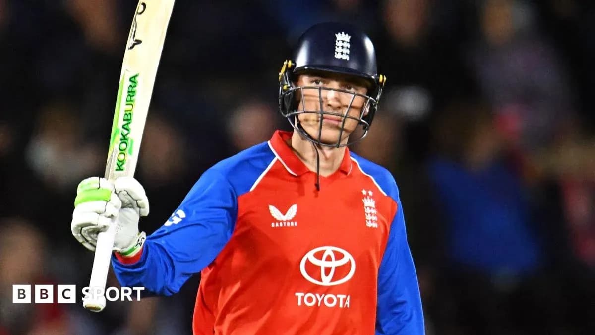 Jugador de cricket celebrando con bate en mano