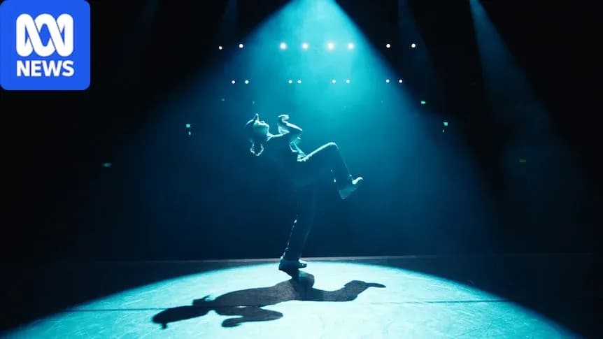 Bailarín en el escenario iluminado por focos