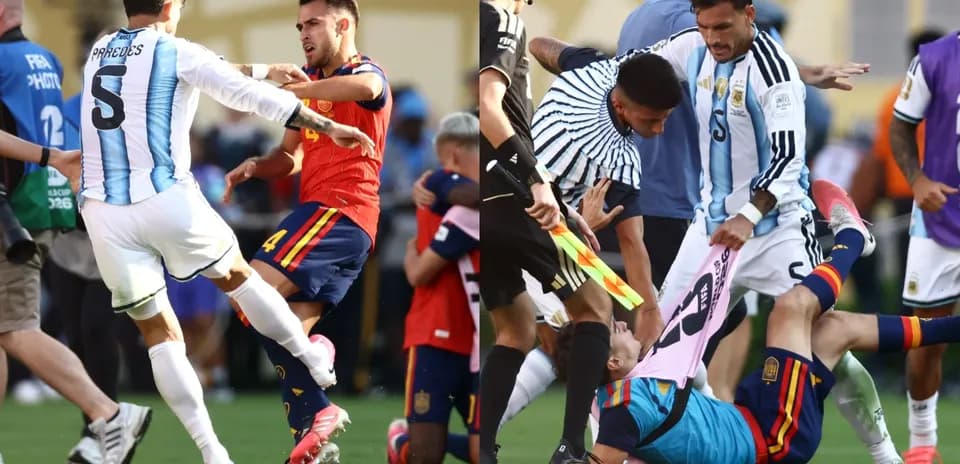 Jugadores de Argentina y España en confrontación durante partido