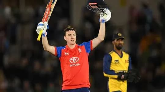 Jugador de cricket celebrando con bate en mano