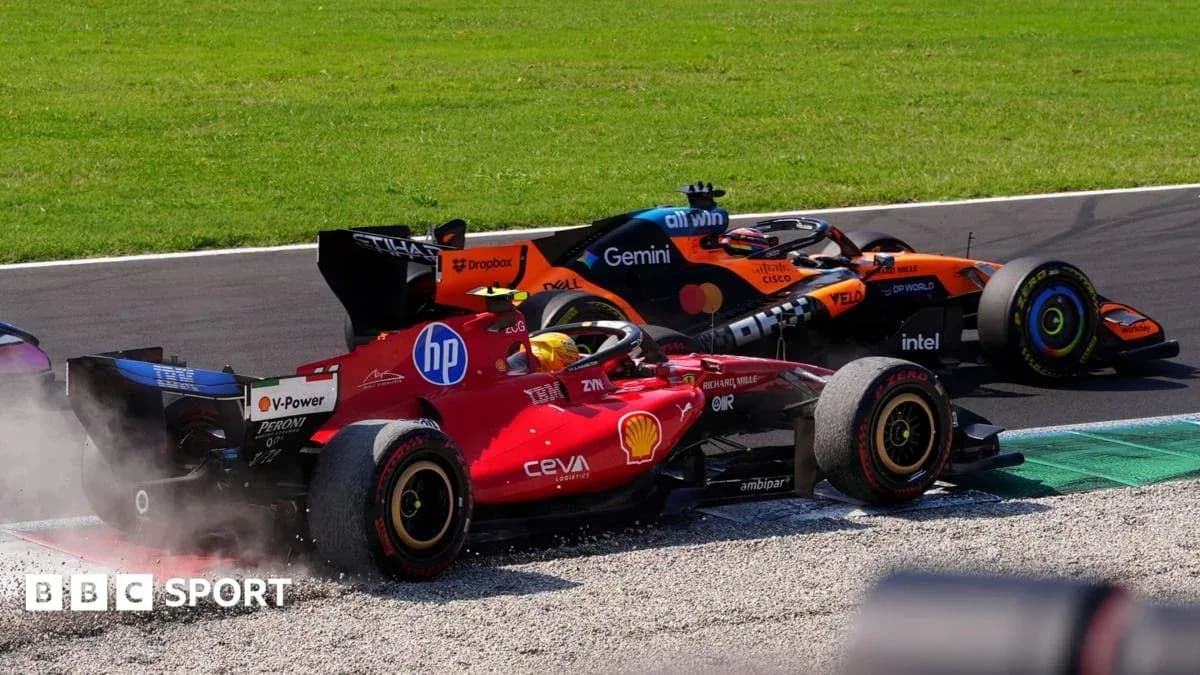 Ferrari y McLaren compitiendo en curva durante carrera Ferrari y McLaren compitiendo en curva durante carrera