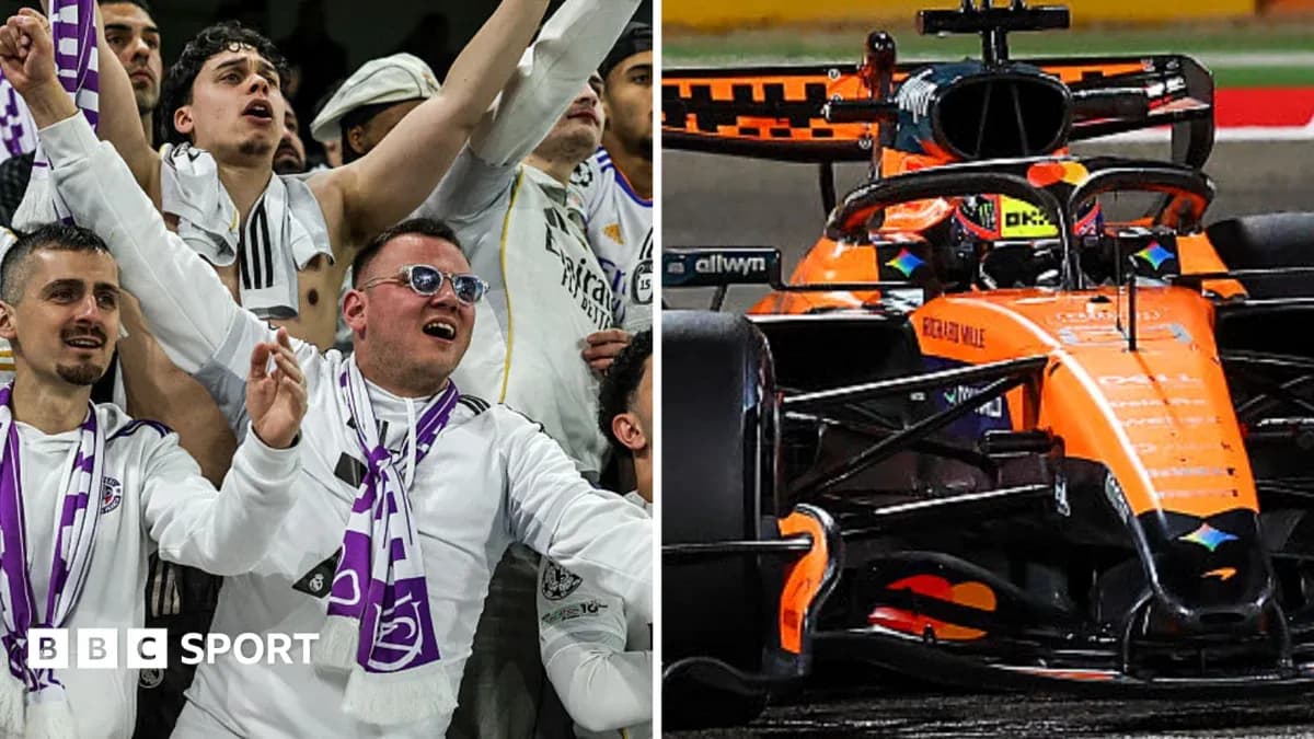 Aficionados de fútbol y coche de Fórmula 1 en acción Aficionados de fútbol y coche de Fórmula 1 en acción