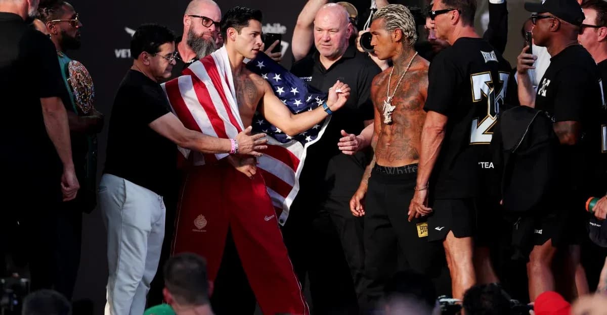 Boxers facing each other during weigh-in event Boxers facing each other during weigh-in event