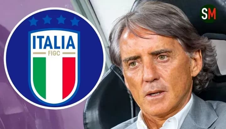 Roberto Mancini junto al escudo de Italia Roberto Mancini junto al escudo de Italia